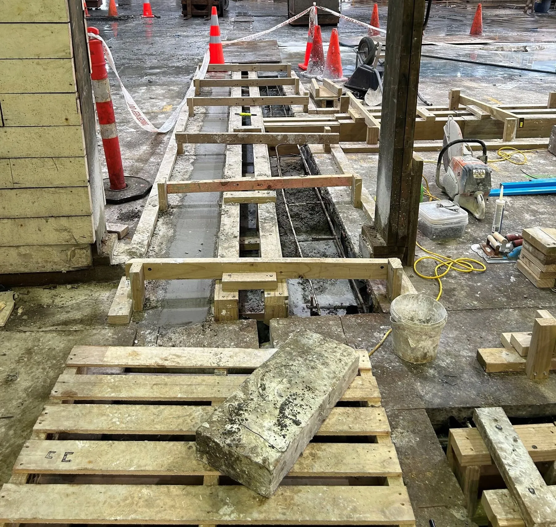 Boxed and braced slot drain sides ready to pour inside a working Timaru factory